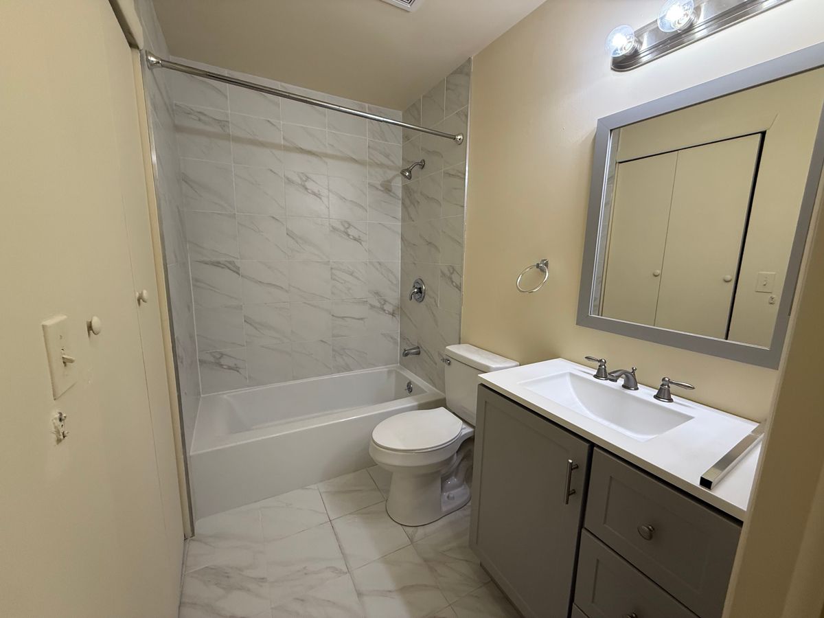 Galley kitchen with granite countertops