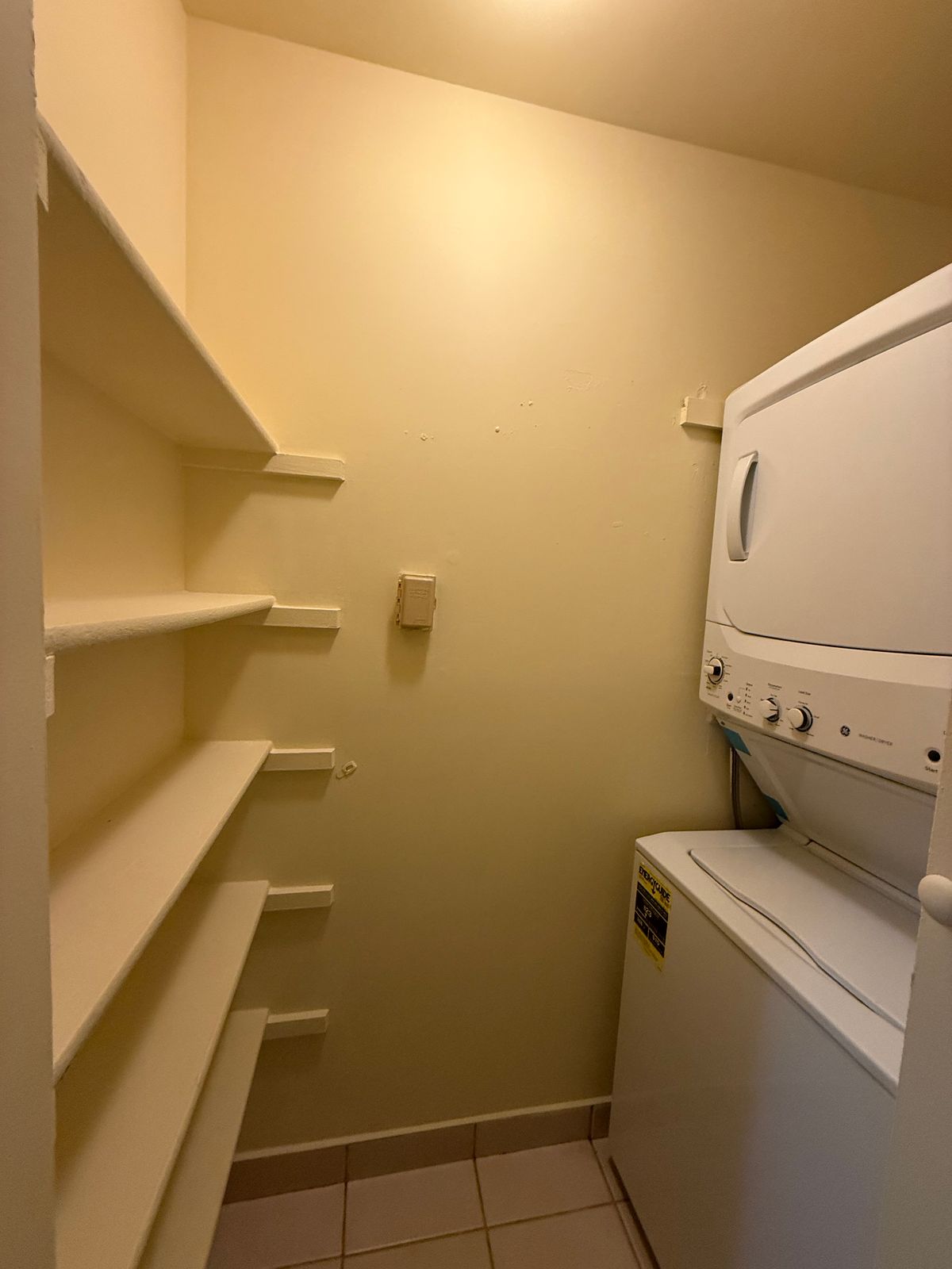 In-unit stacked washer and dryer